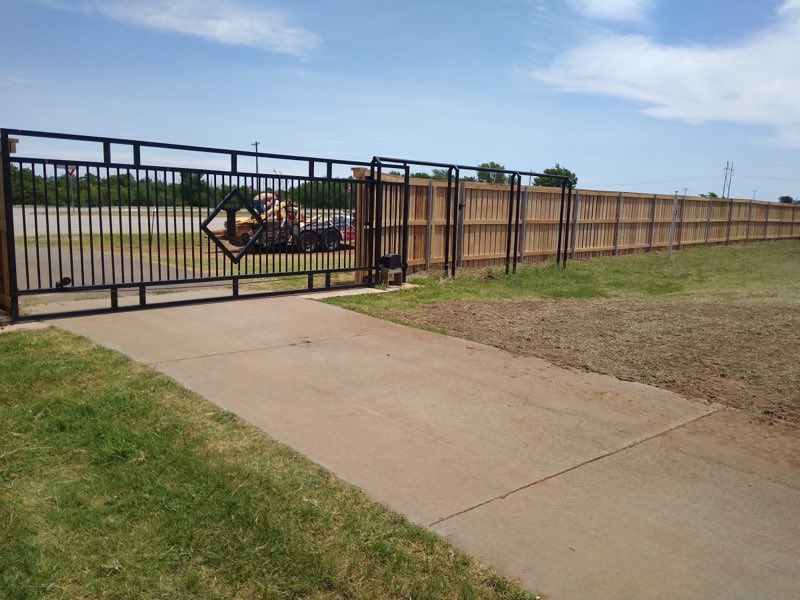 An Affordable Fence and More iron gate work photo
